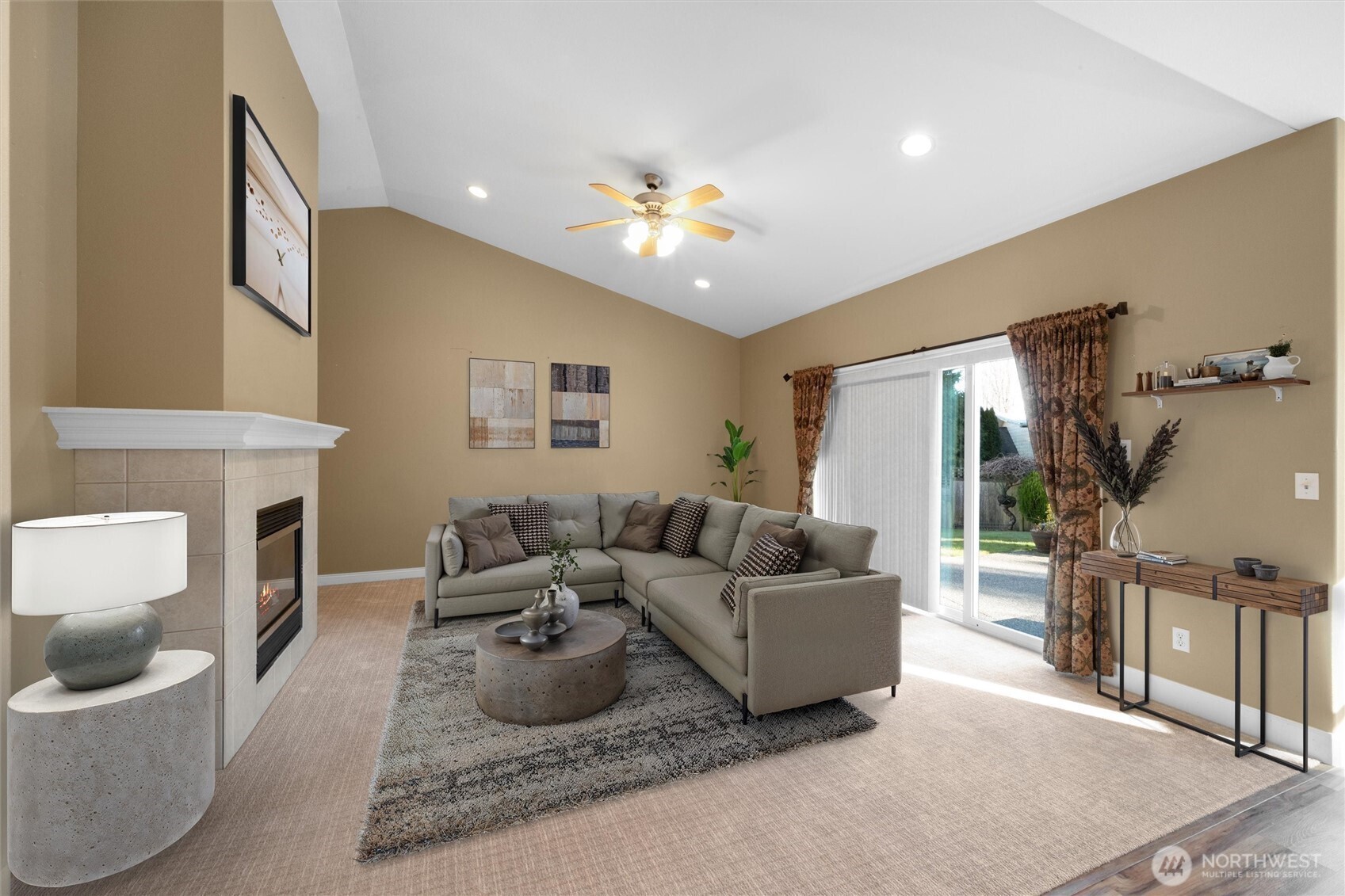 8148 Quinault Road Blaine, WA 98230 - Photo 4 of 40 a living room with furniture and a fireplace