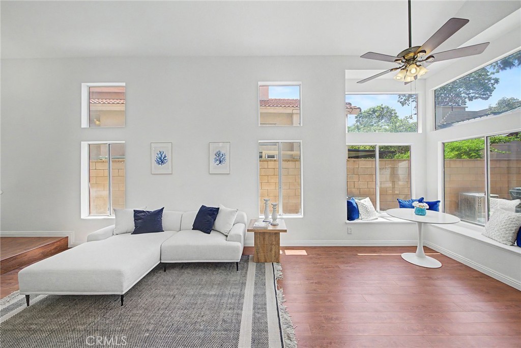 15377 Tobarra Road Fontana, CA 92337 - Photo 6 of 38 Bright and airy living room with ceiling fan
