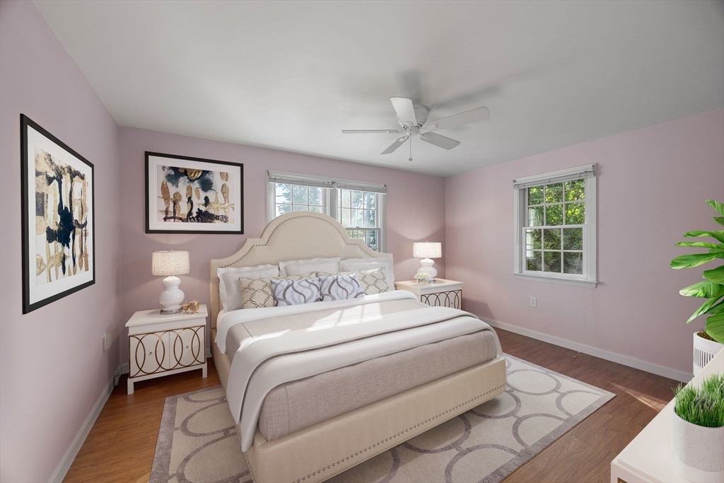 12 Spoonbill Road Dennis, MA 02670 - Photo 13 of 26 a bedroom with a large bed and a window