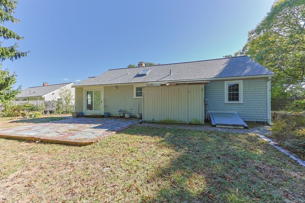 12 Spoonbill Road Dennis, MA 02670 - Photo 23 of 26 a view of a house with backyard and garden