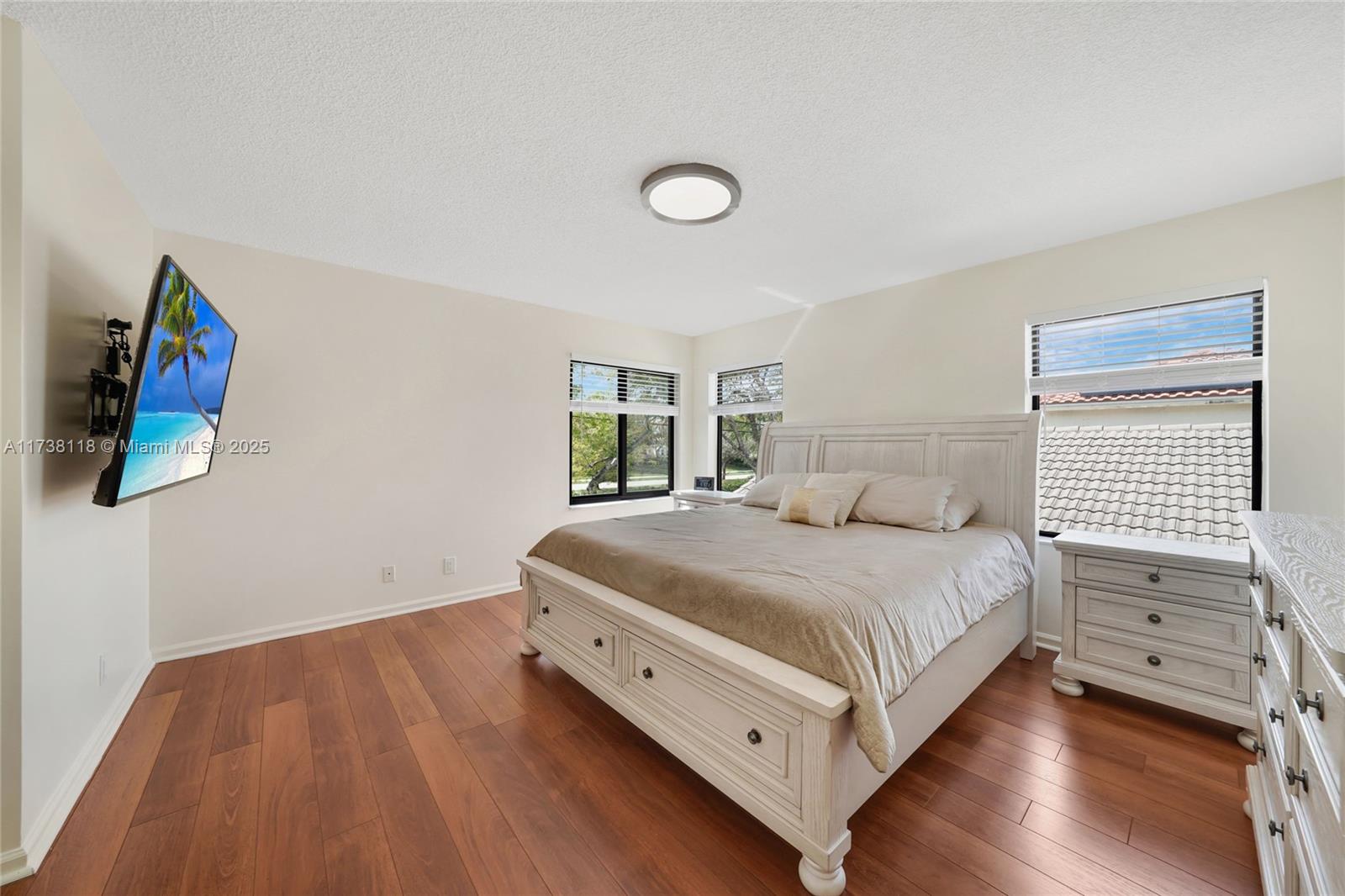 Silver Shores Miramar, FL 33027 - Photo 17 of 42 a bedroom with a bed and a window