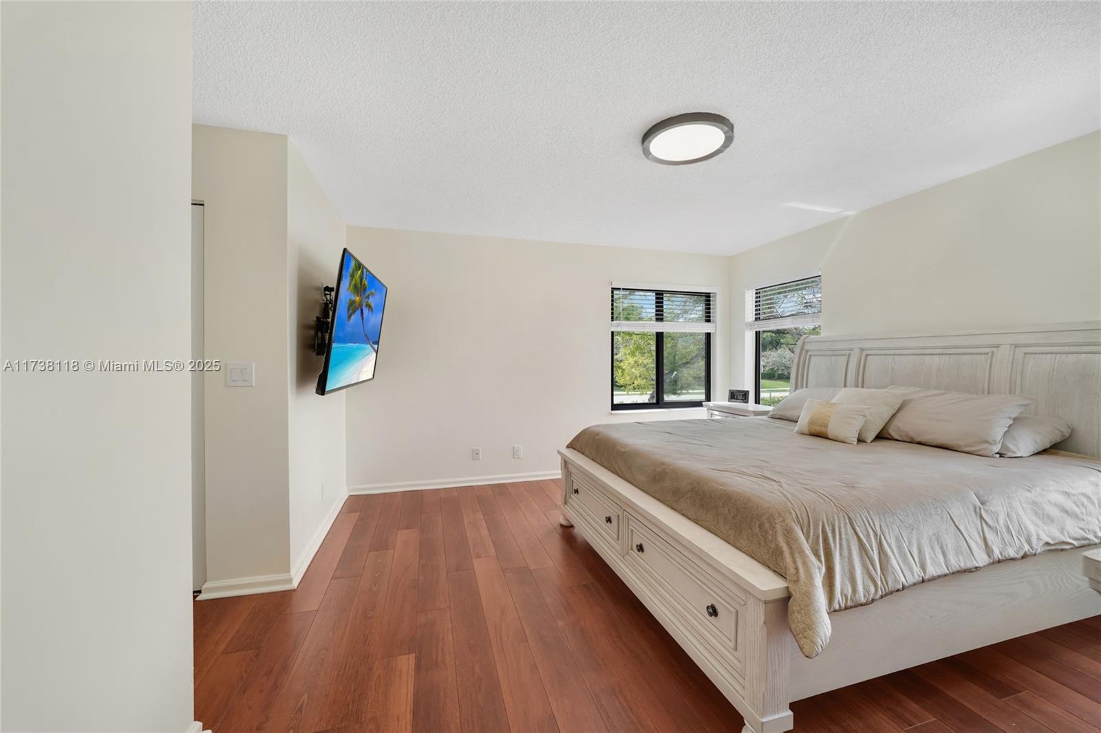 Silver Shores Miramar, FL 33027 - Photo 18 of 42 a bedroom with a bed and a window