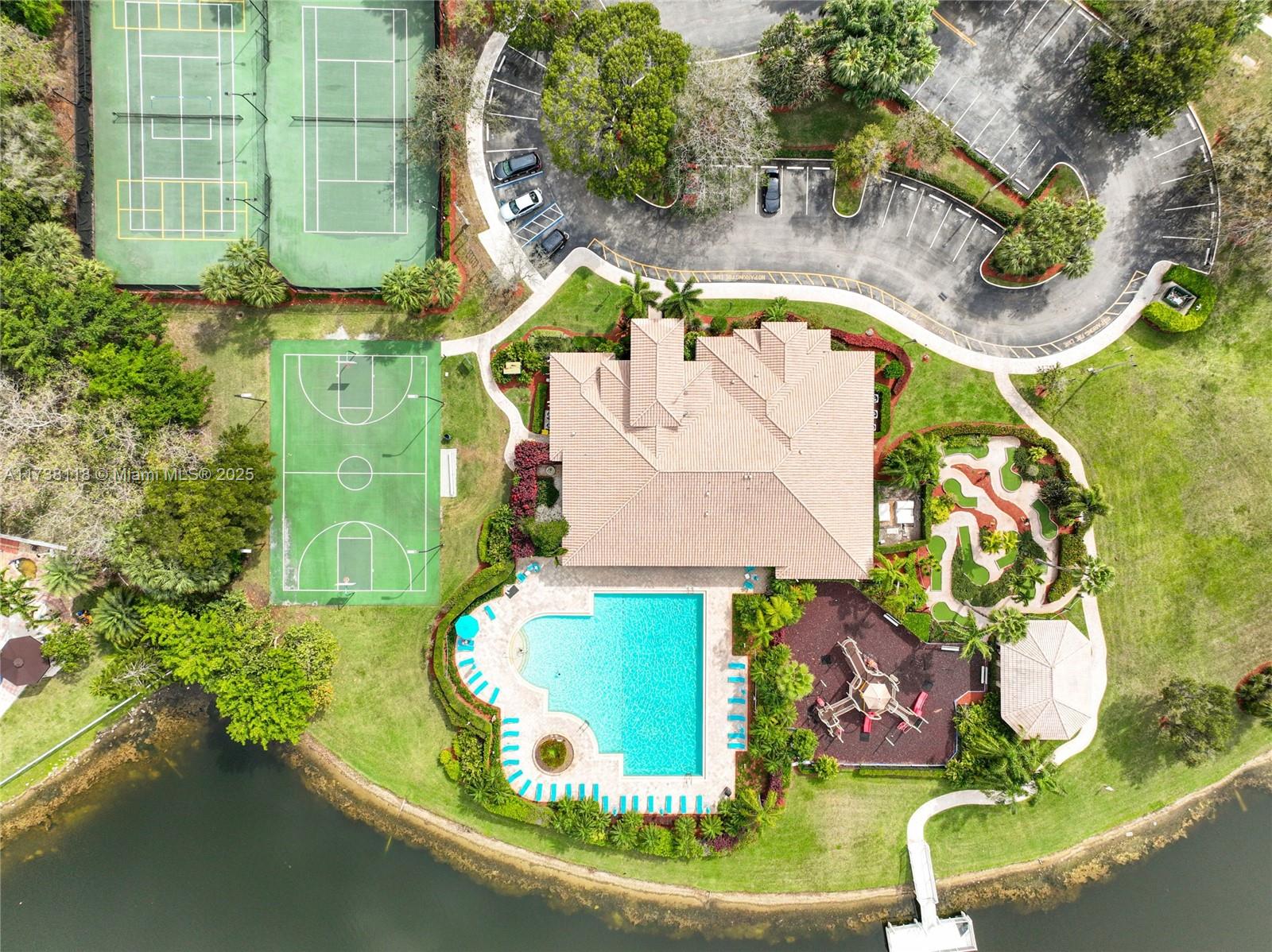 Silver Shores Miramar, FL 33027 - Photo 2 of 42 an aerial view of a house with a swimming pool