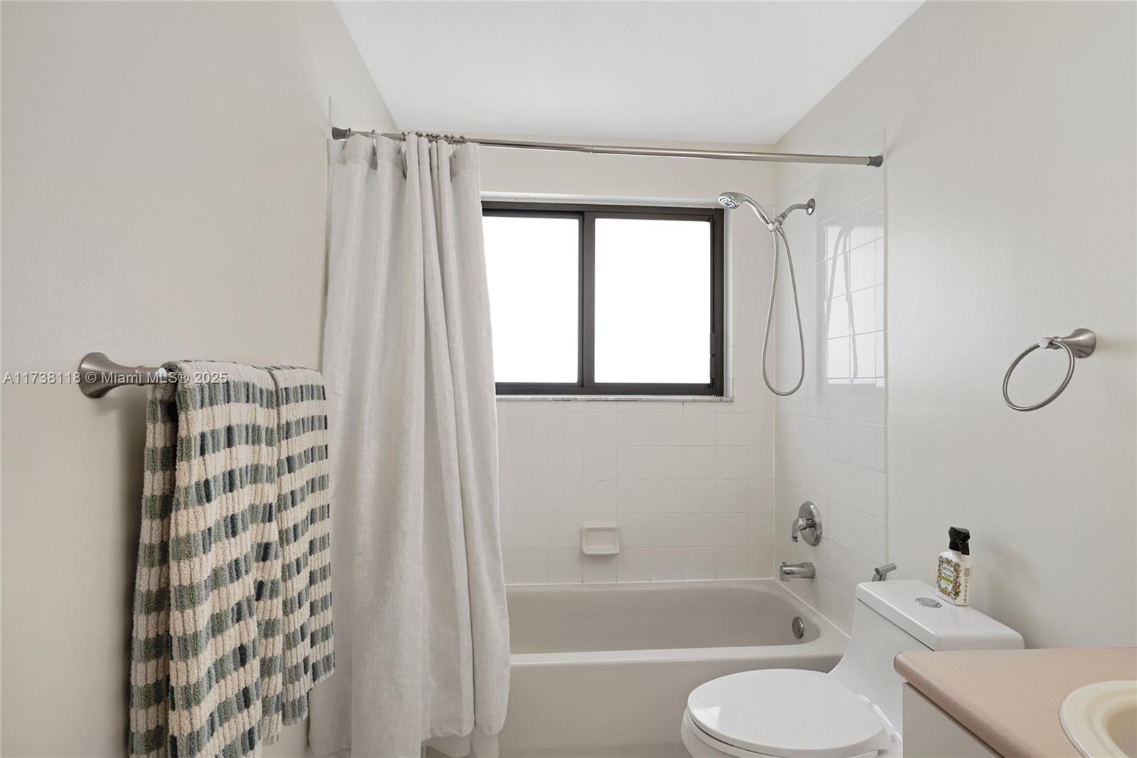 Silver Shores Miramar, FL 33027 - Photo 28 of 42 a bathroom with a bathtub and shower