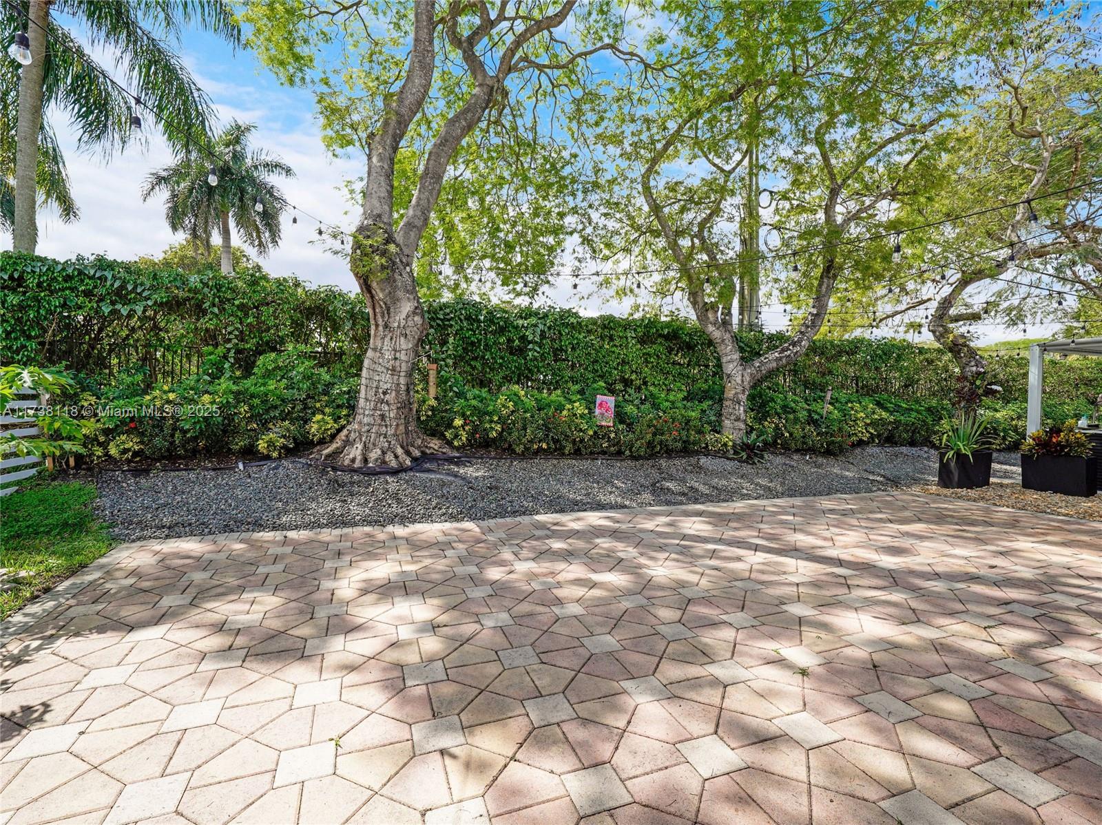 Silver Shores Miramar, FL 33027 - Photo 32 of 42 a view of backyard with green space