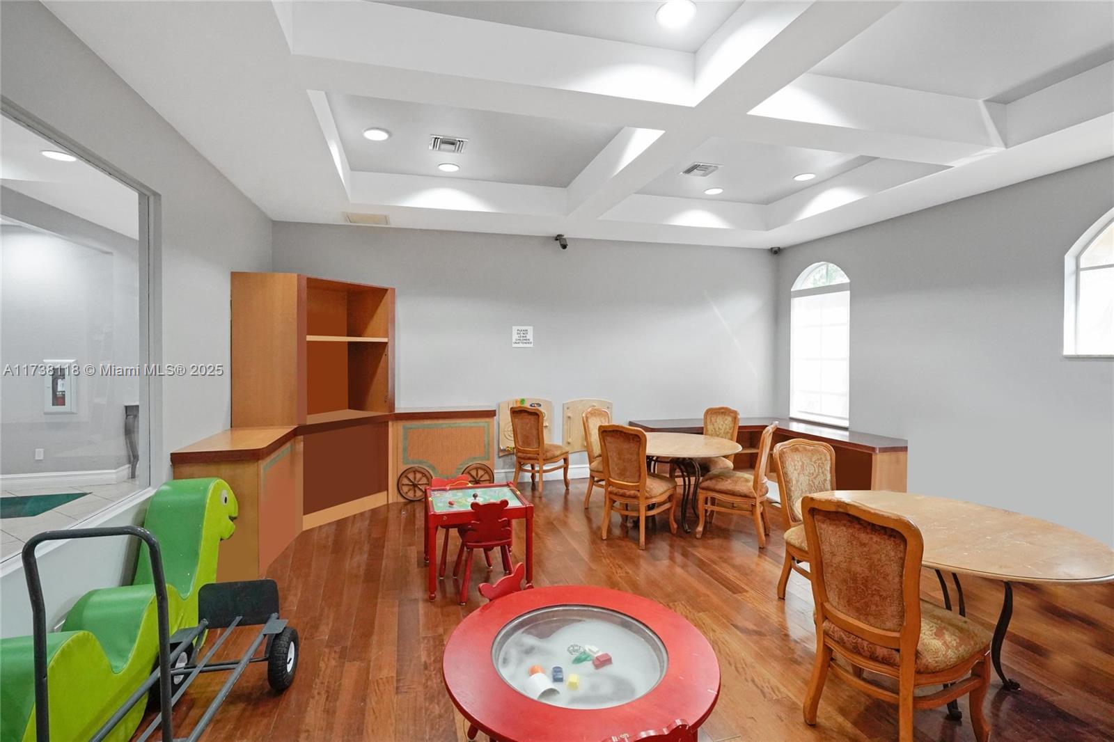 Silver Shores Miramar, FL 33027 - Photo 38 of 42 a dining room with furniture a rug and wooden floor