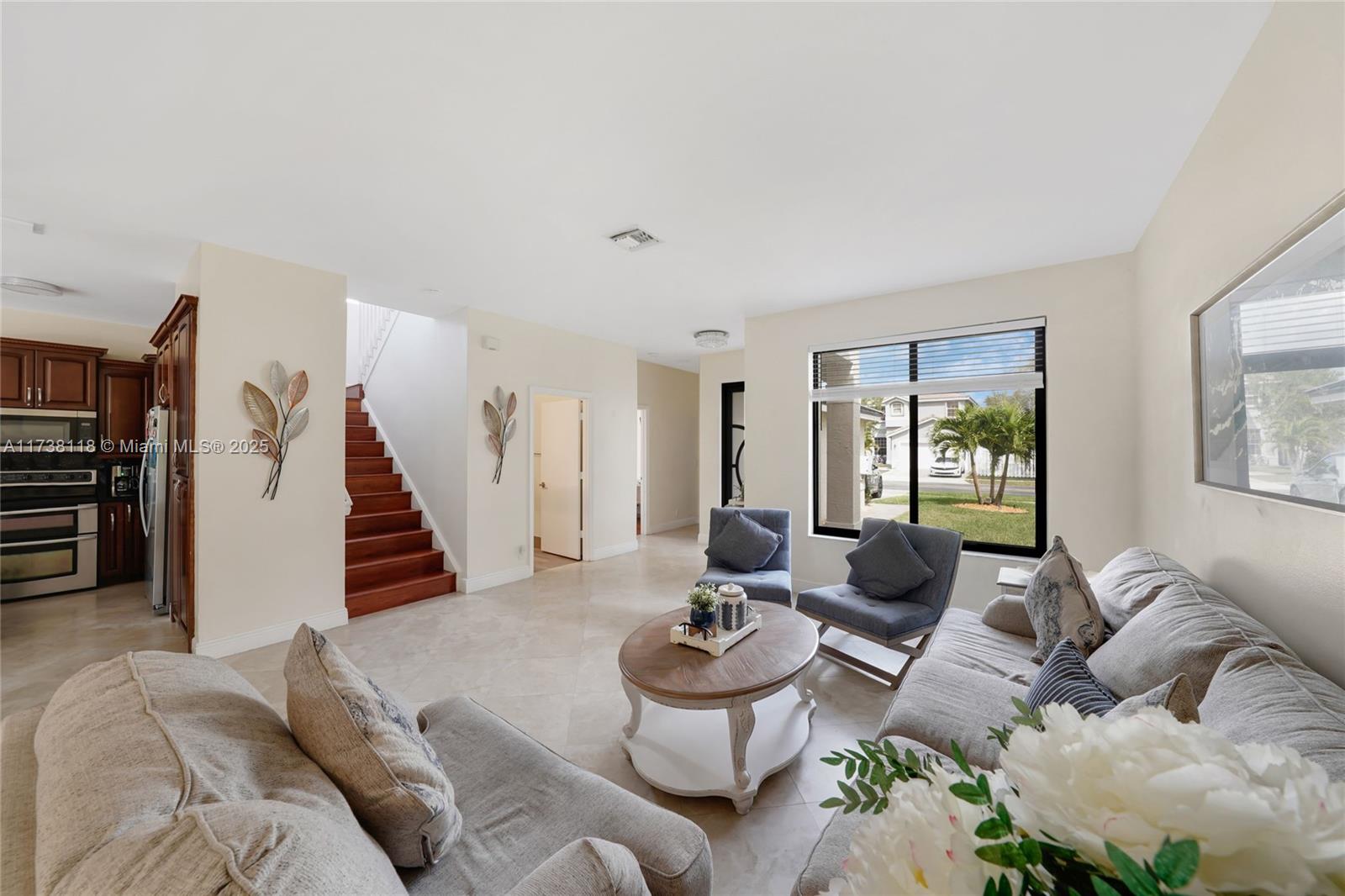 Silver Shores Miramar, FL 33027 - Photo 5 of 42 a living room with furniture and wooden floor