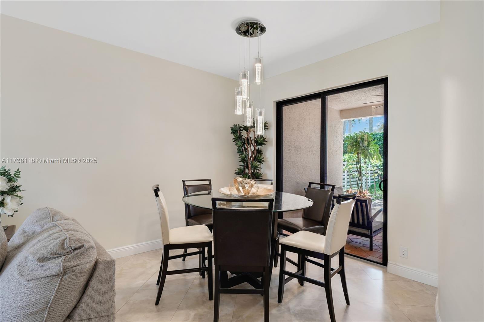 Silver Shores Miramar, FL 33027 - Photo 7 of 42 a dining room with furniture and window