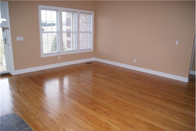 4808 Somerville Road Cross Plains, TN 37049 - Photo 15 of 18 a view of an empty room with wooden floor and a window