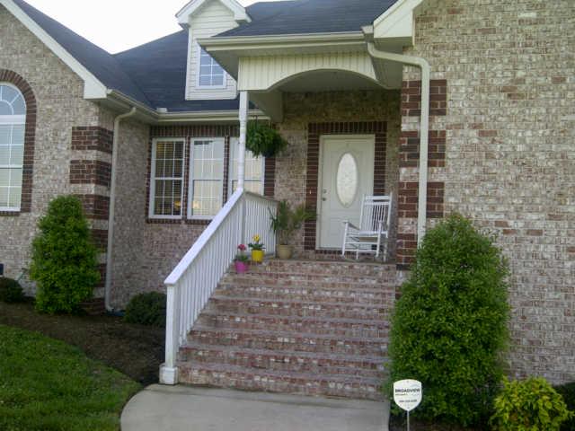 4808 Somerville Road Cross Plains, TN 37049 - Photo 3 of 18 a front view of a house with plants