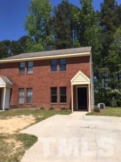 2709 Big Oak Street Raleigh, NC 27610 - Photo 12 of 12 a front view of a house with a yard
