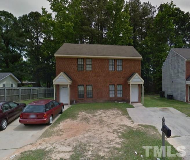 2709 Big Oak Street Raleigh, NC 27610 - Photo 3 of 12 a front view of a house with garden