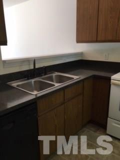 2709 Big Oak Street Raleigh, NC 27610 - Photo 6 of 12 a close view of sink and a mirror