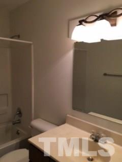 2709 Big Oak Street Raleigh, NC 27610 - Photo 9 of 12 a bathroom with a bathtub and shower