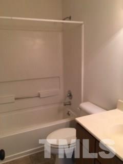 2709 Big Oak Street Raleigh, NC 27610 - Photo 10 of 12 a bathroom with a sink and a toilet