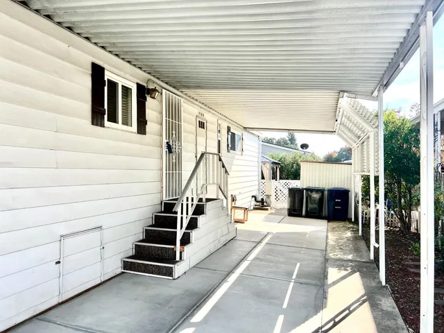 a view of a porch with furniture