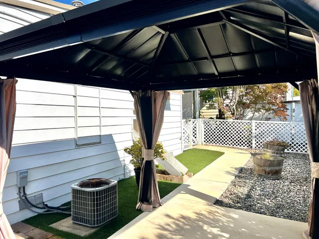 a view of a porch with furniture