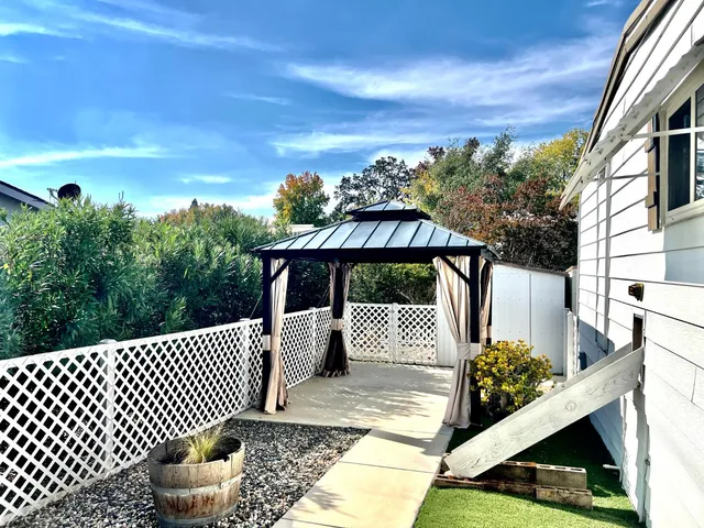 a view of a house with a garden
