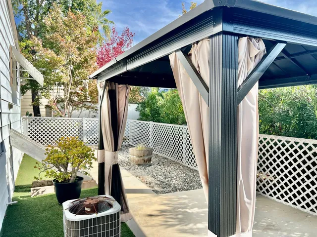 a view of back yard from balcony