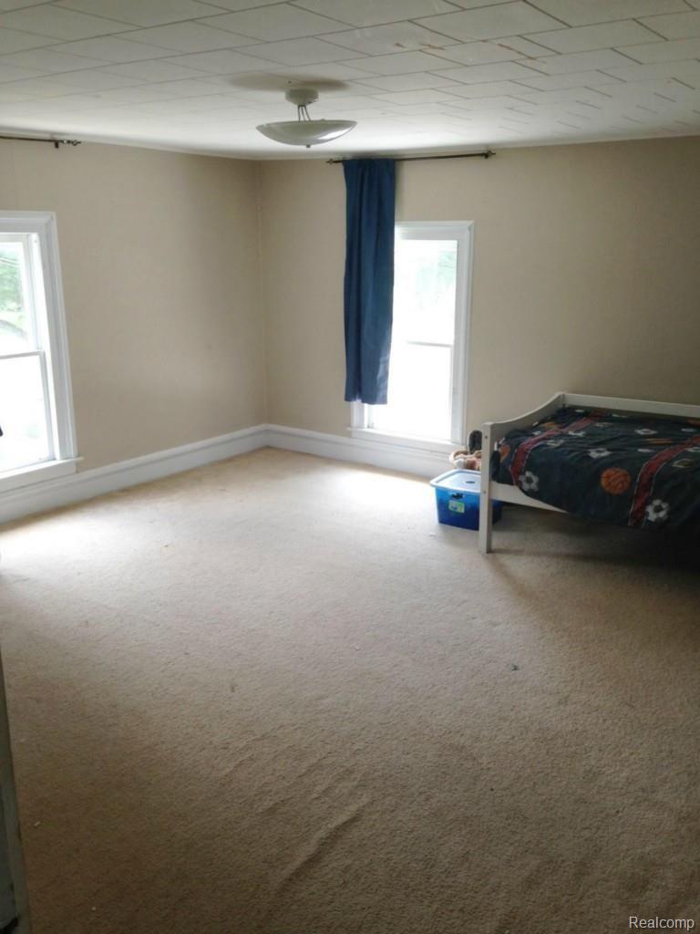 148 Pleasant Street Romeo, MI 48065 - Photo 23 of 32 #23 3rd bedroom.jpg