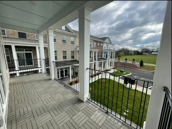 an outdoor view of a house with balcony