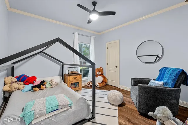 a spacious bathroom with a granite countertop toilet a sink and a bathtub