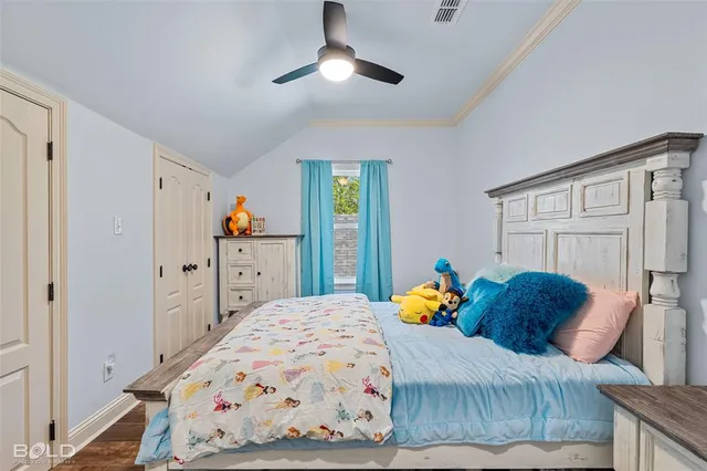 a bathroom with a double vanity sink mirror and bathtub