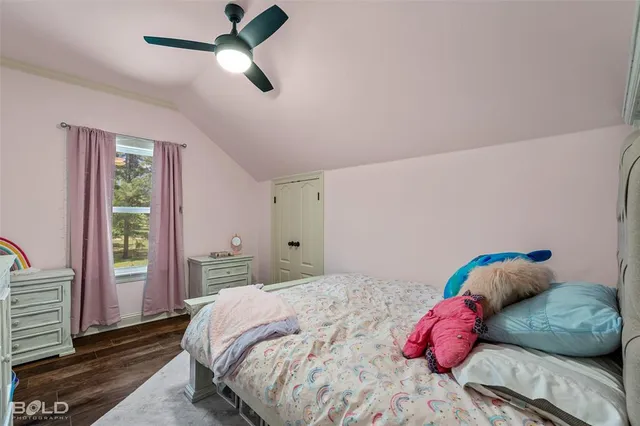 a bathroom with a granite countertop double vanity sink mirror and