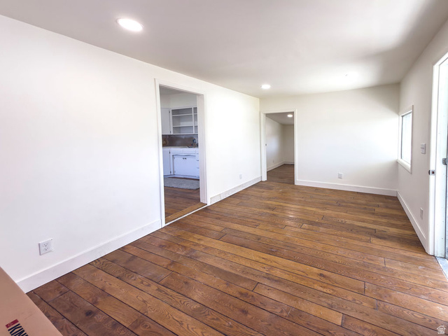 2454 East Old Wellington Road Price, UT 84501 - Photo 18 of 27 Unfurnished bedroom featuring dark wood-style flooring and recessed lighting