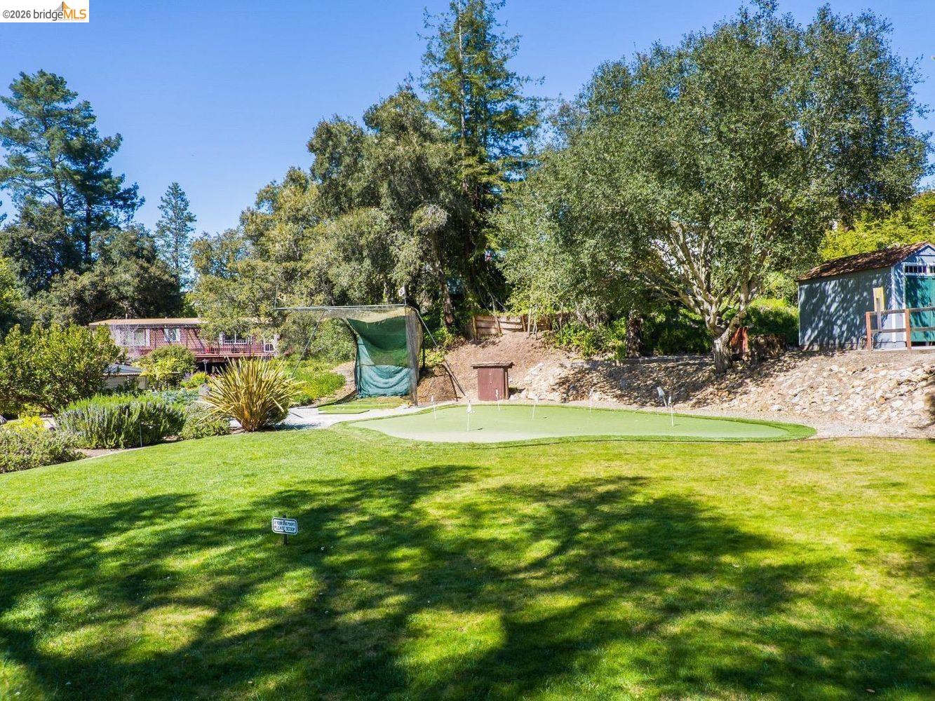 552 Bean Creek Road, Unit SPC 94 Scotts Valley, CA 95066 - Photo 23 of 23 a garden view with a seating space