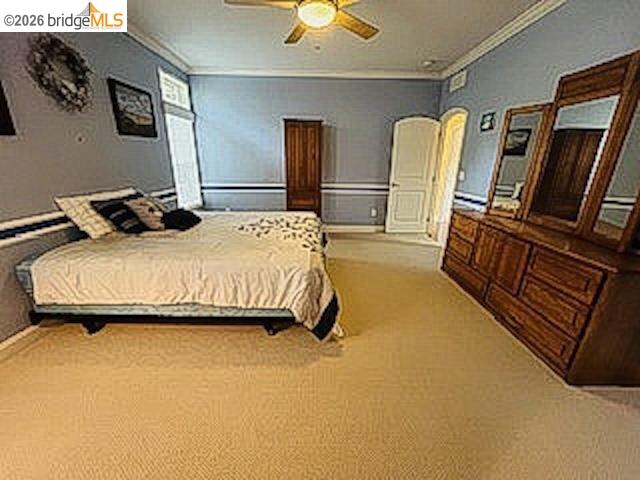 552 Bean Creek Road, Unit SPC 94 Scotts Valley, CA 95066 - Photo 9 of 23 a bedroom with a bed and dresser with wooden floor