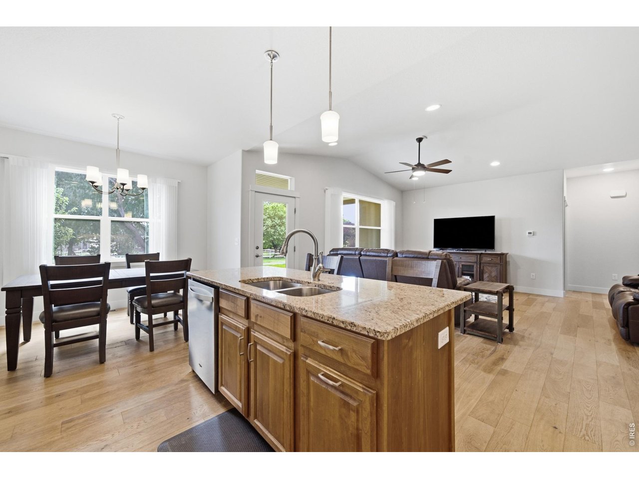 1263 Swainson Road Eaton, CO 80615 - Photo 7 of 29 Kitchen opens up to the living and dining rooms.
