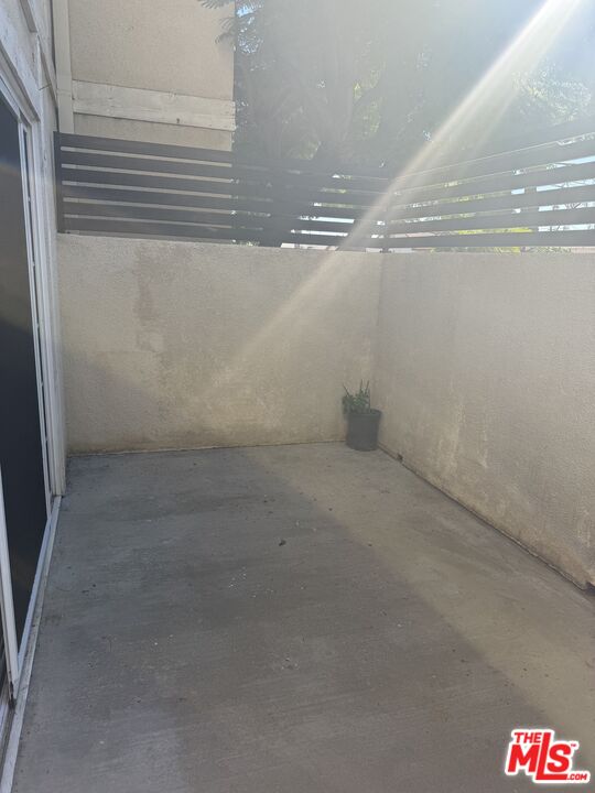 7639 Kester Avenue, Unit 1 Van Nuys, CA 91405 - Photo 18 of 21 a view of a room with racks on the wall