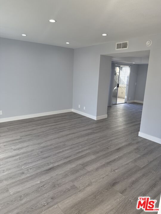 7639 Kester Avenue, Unit 1 Van Nuys, CA 91405 - Photo 6 of 21 a view of livingroom and hardwood floor