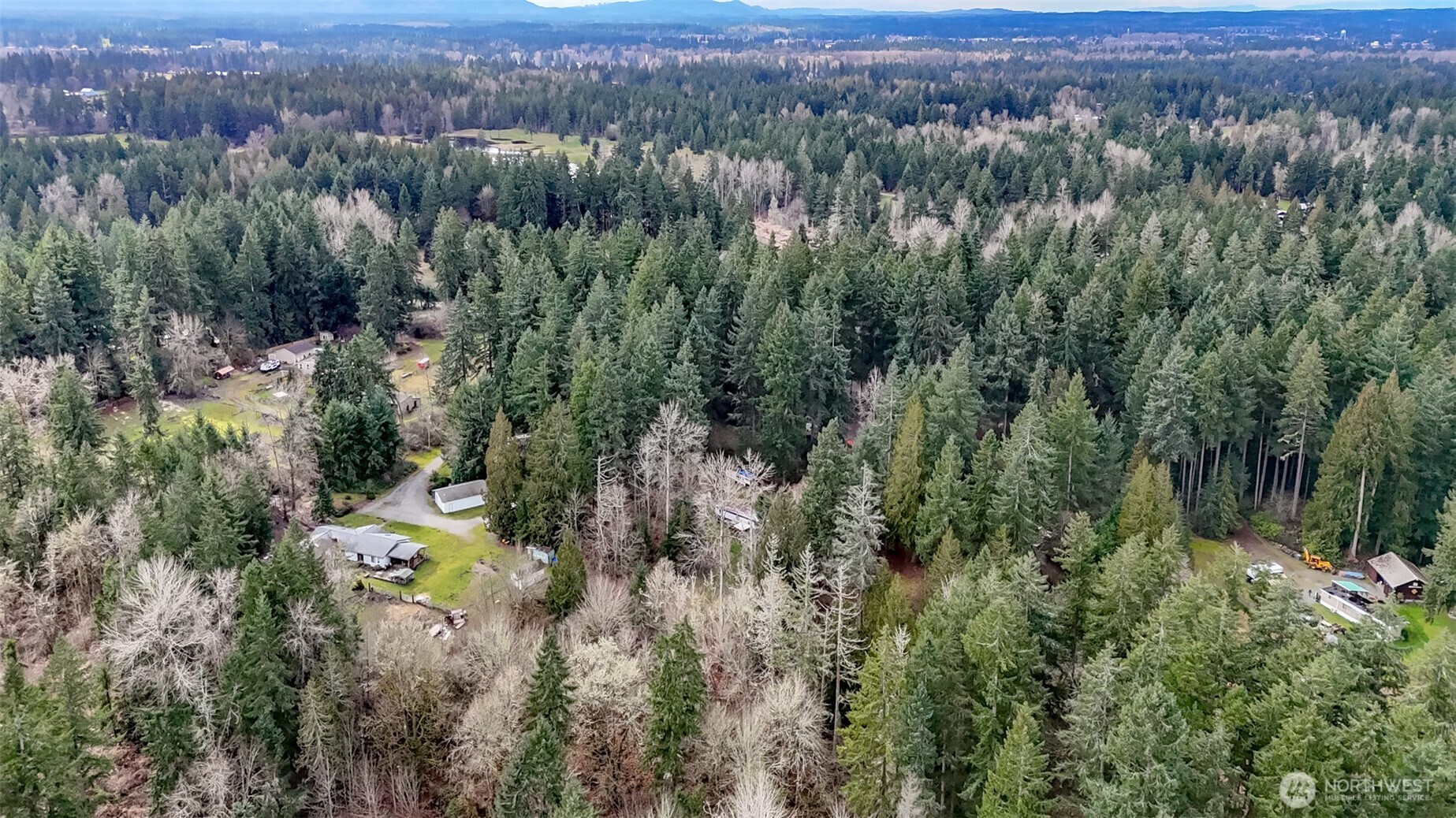 7308 335th St Court South Roy, WA 98580 - Photo 17 of 21 an aerial view of a city with lots of residential buildings