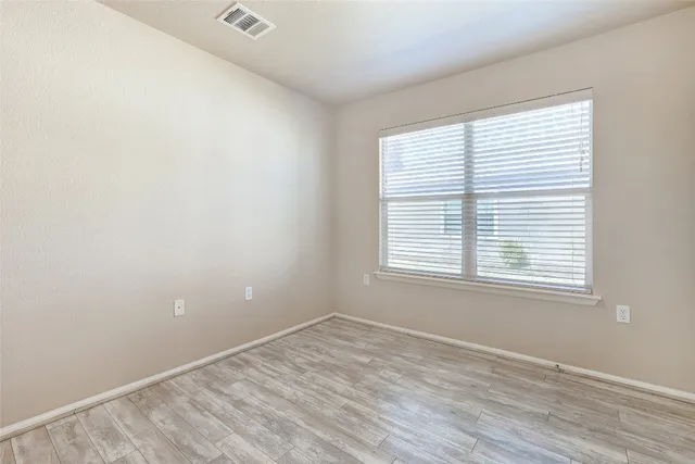 an empty room with a window