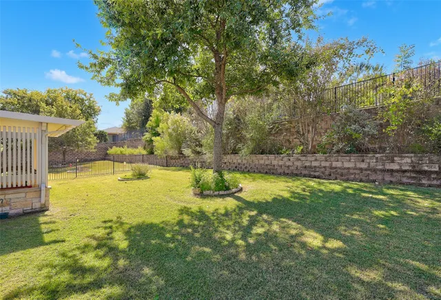 a view of swimming pool from a garden