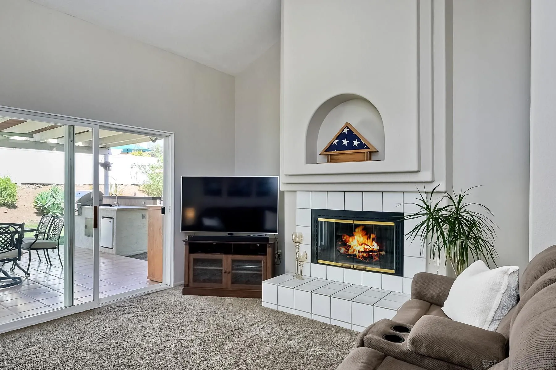 2866 Manzanita View Road Alpine, CA 91901 - Photo 11 of 39 a living room with furniture a fireplace and a flat screen tv
