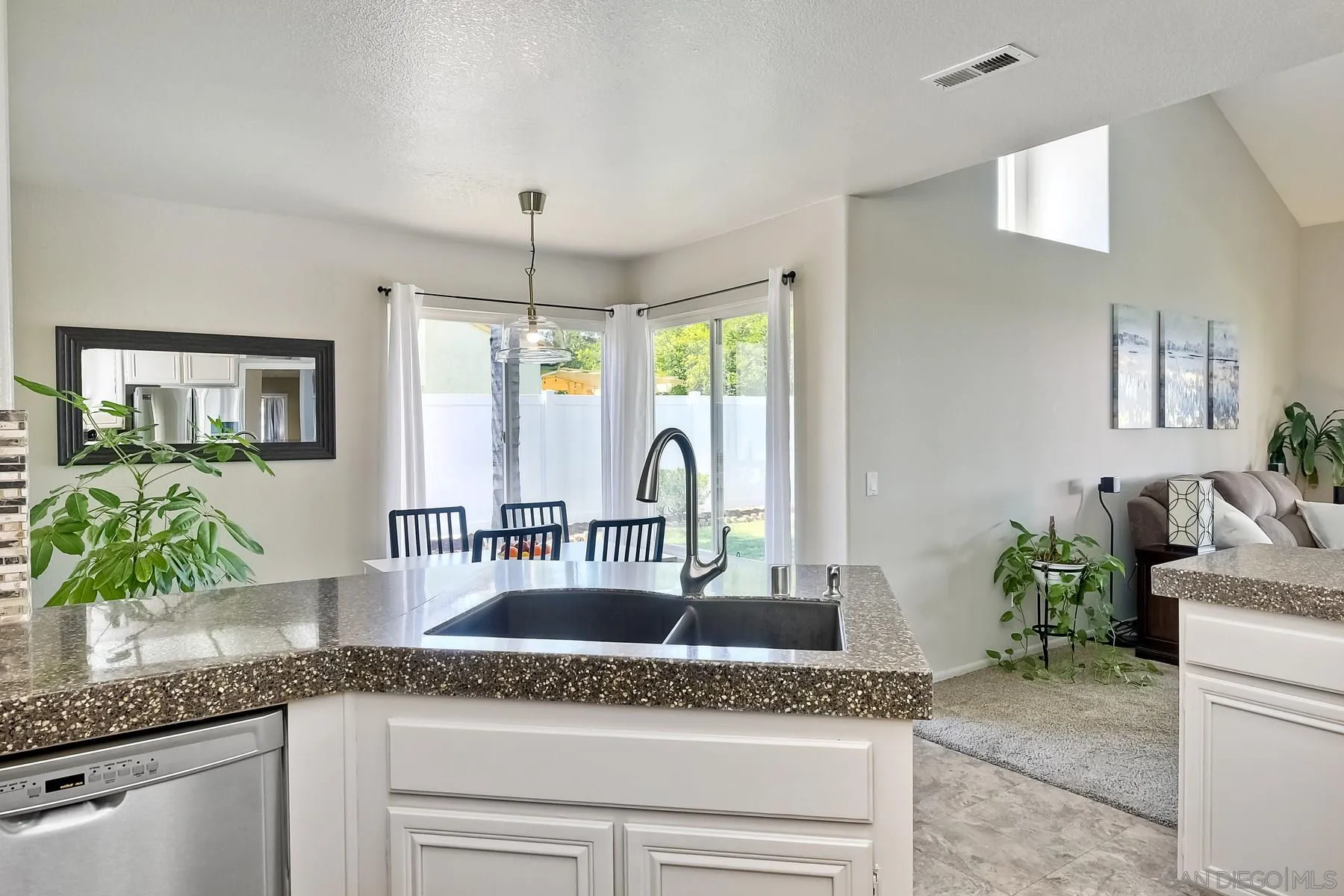 2866 Manzanita View Road Alpine, CA 91901 - Photo 18 of 39 a kitchen with granite countertop a sink and a window