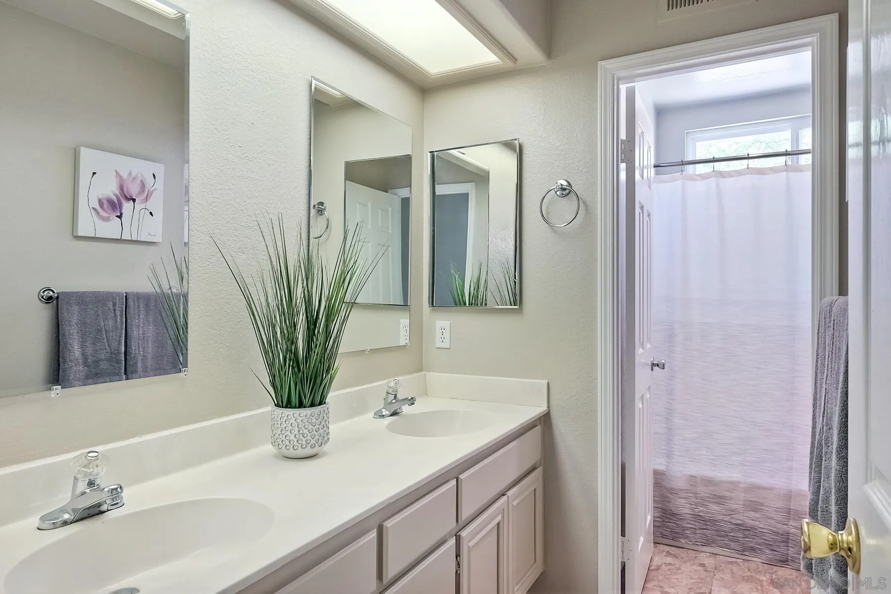 2866 Manzanita View Road Alpine, CA 91901 - Photo 30 of 39 a bathroom with a sink a mirror and a shower