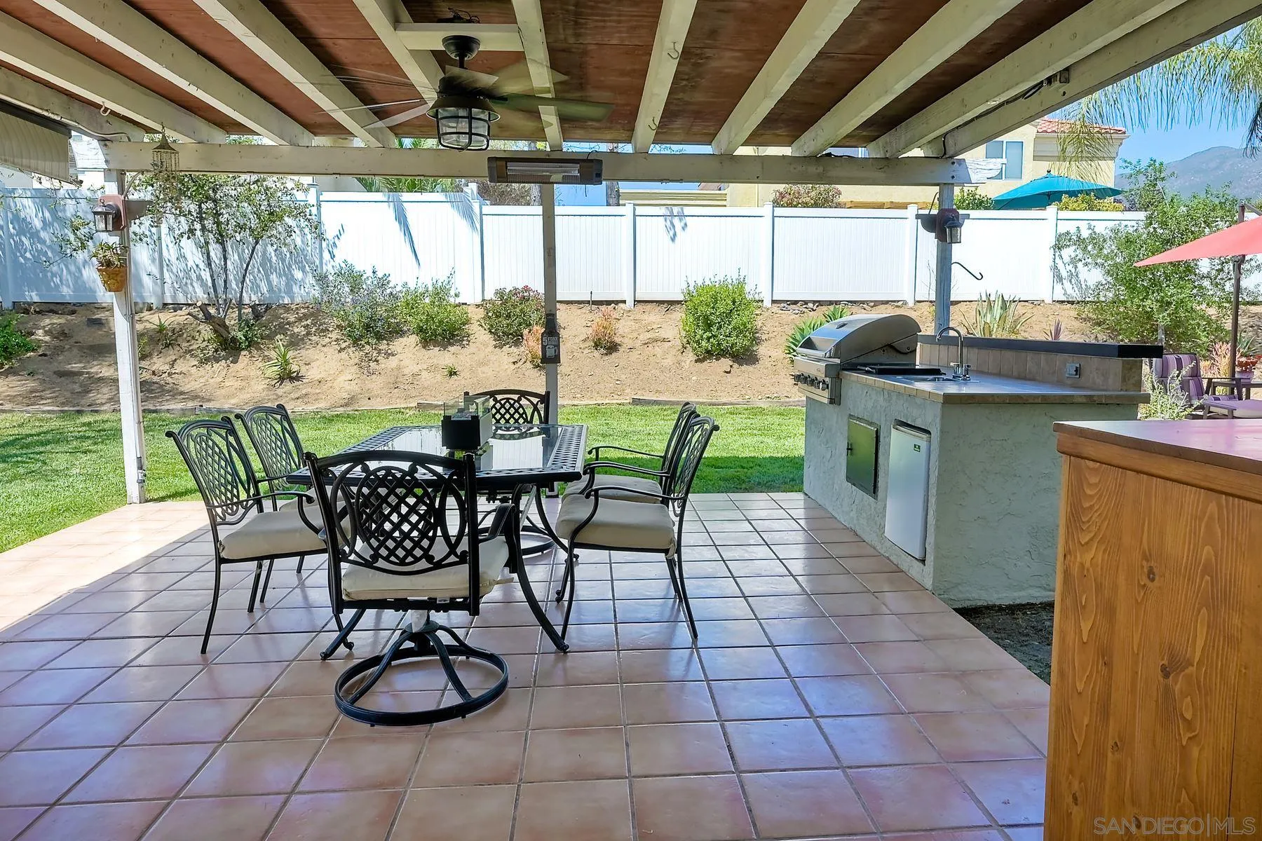 2866 Manzanita View Road Alpine, CA 91901 - Photo 32 of 39 a view of a patio with a table and chairs