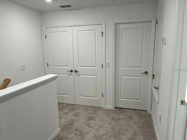 an empty room with closet