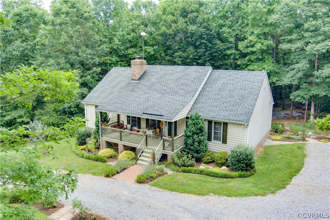 3940 Whitehall Road Sandy Hook, VA 23153 - Photo 1 of 49 a aerial view of a house with yard and green space