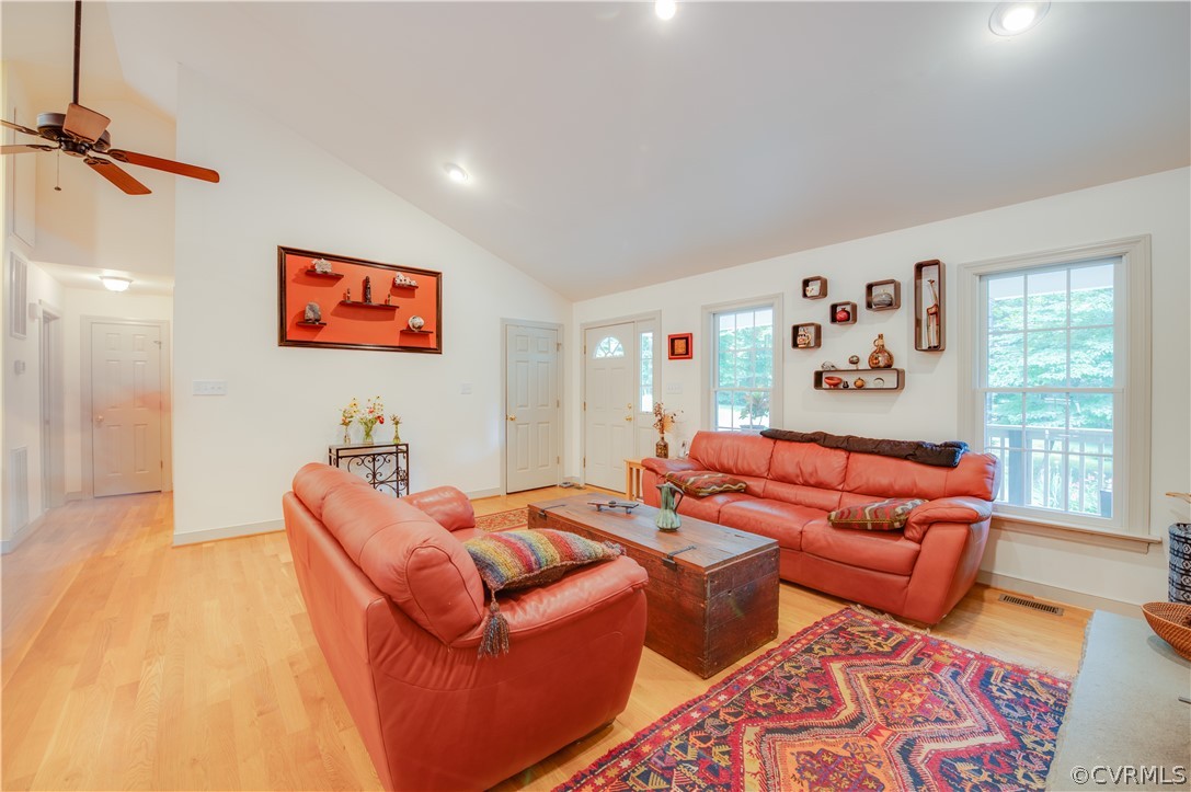 3940 Whitehall Road Sandy Hook, VA 23153 - Photo 24 of 49 a living room with furniture and a flat screen tv