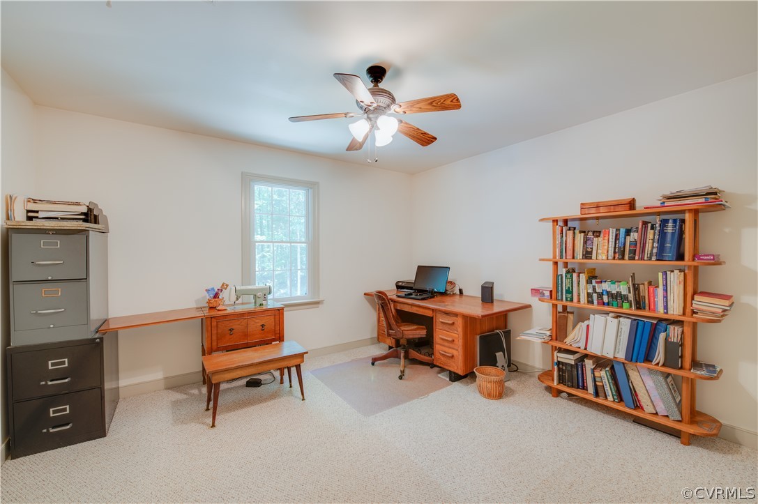 3940 Whitehall Road Sandy Hook, VA 23153 - Photo 33 of 49 a workspace with a bookshelf