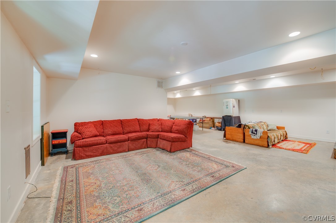 3940 Whitehall Road Sandy Hook, VA 23153 - Photo 41 of 49 a room with a bed and a couch