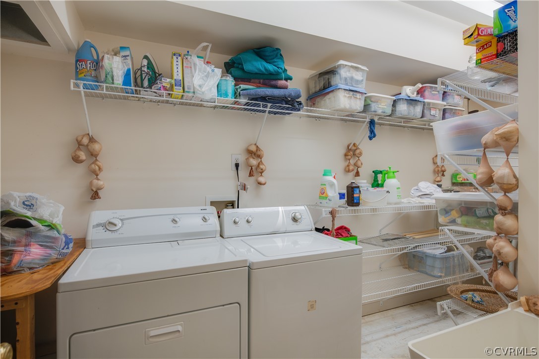 3940 Whitehall Road Sandy Hook, VA 23153 - Photo 47 of 49 a room with a sink and cabinets