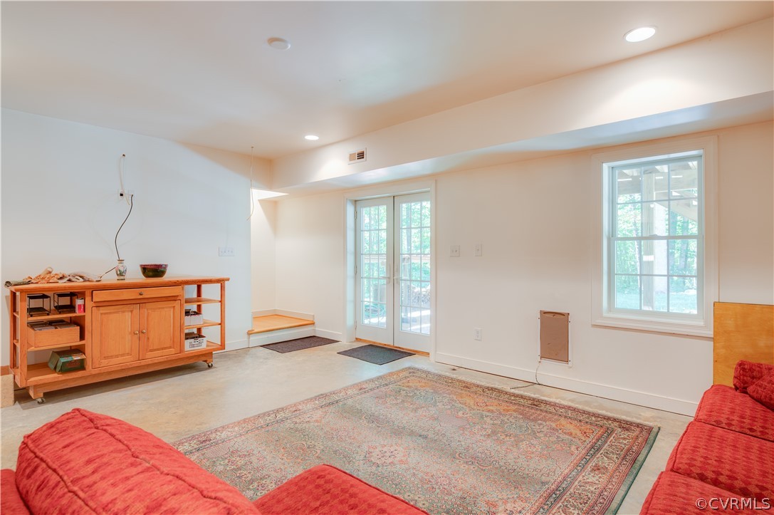 3940 Whitehall Road Sandy Hook, VA 23153 - Photo 48 of 49 a bedroom with a bed and wooden floor