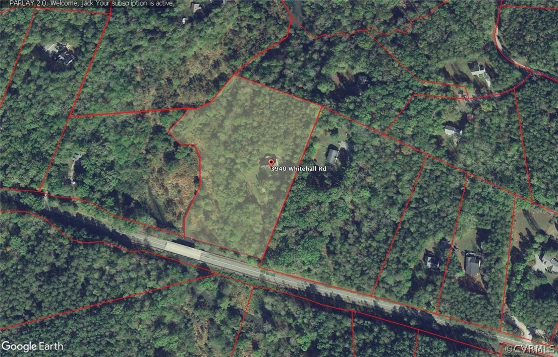 3940 Whitehall Road Sandy Hook, VA 23153 - Photo 49 of 49 an aerial view of a houses with outdoor space and trees
