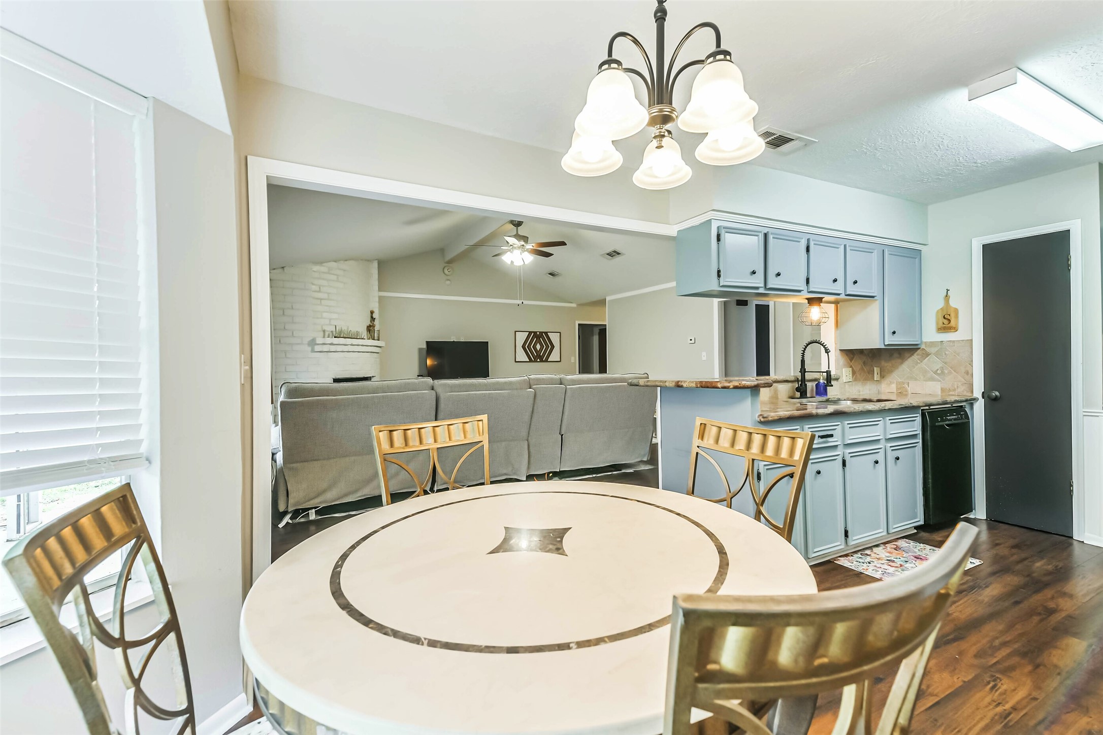 29319 Binefield Street Spring, TX 77386 - Photo 12 of 32 a very nice looking dining room with a table and chairs